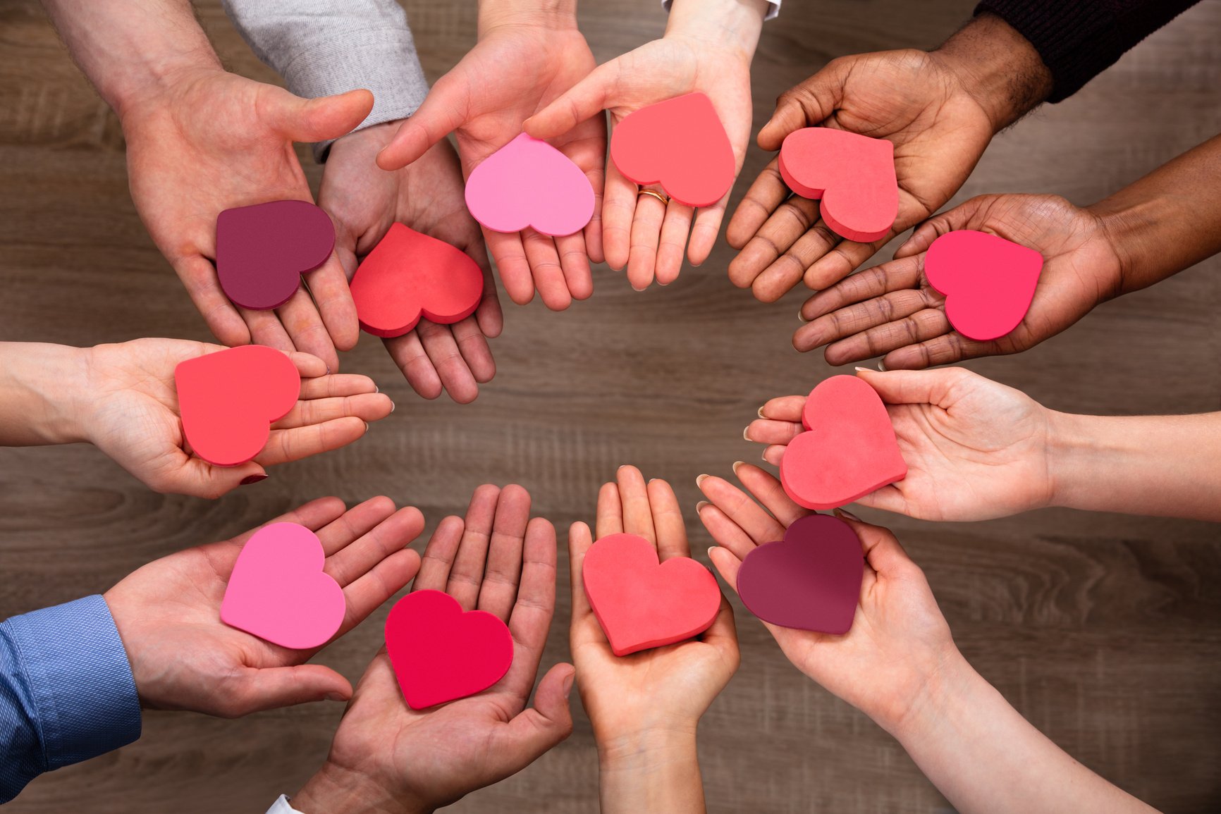 People's Hand Making Circle With Heart Shape